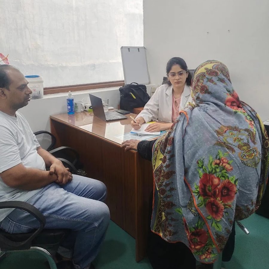 Doctor consulting with patients